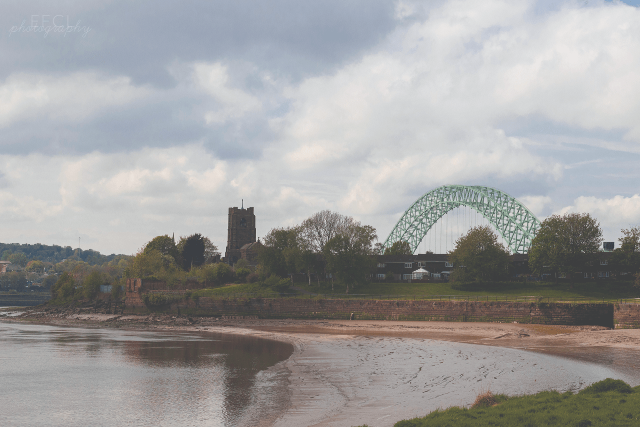 View of Silver Jubilee bridge across estuary